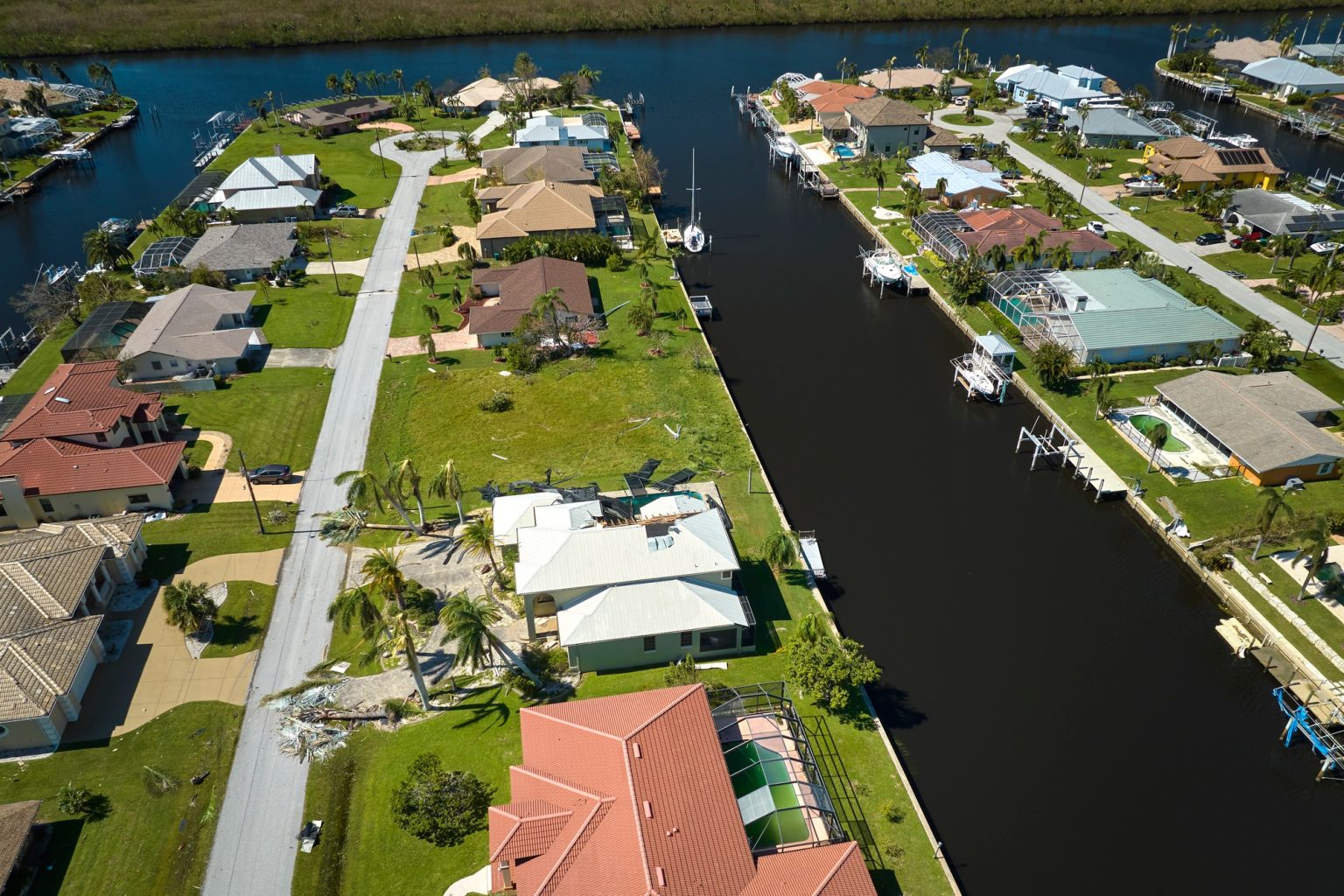 Destroyed by hurricane Ian suburban coastal houses in Florida home residential area.